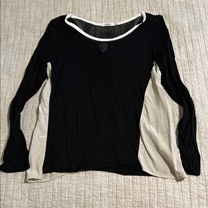 🔥🔥Aiko gorgeous top with side sheer inserts and leather back